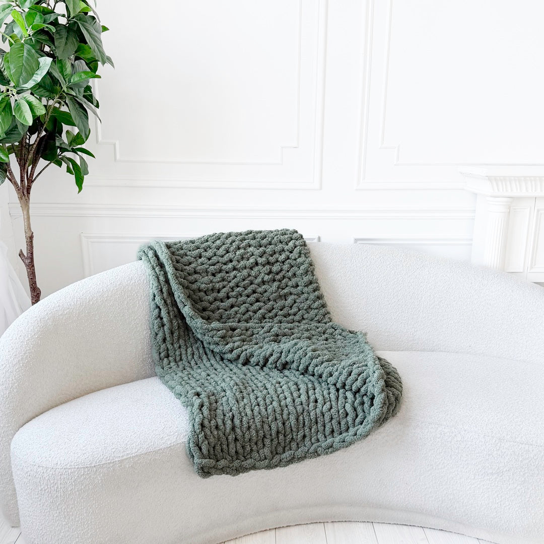 Oversized cozy blanket with hand-knit chunky texture